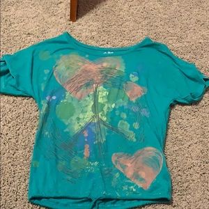 Green paint splatter effect shirt.